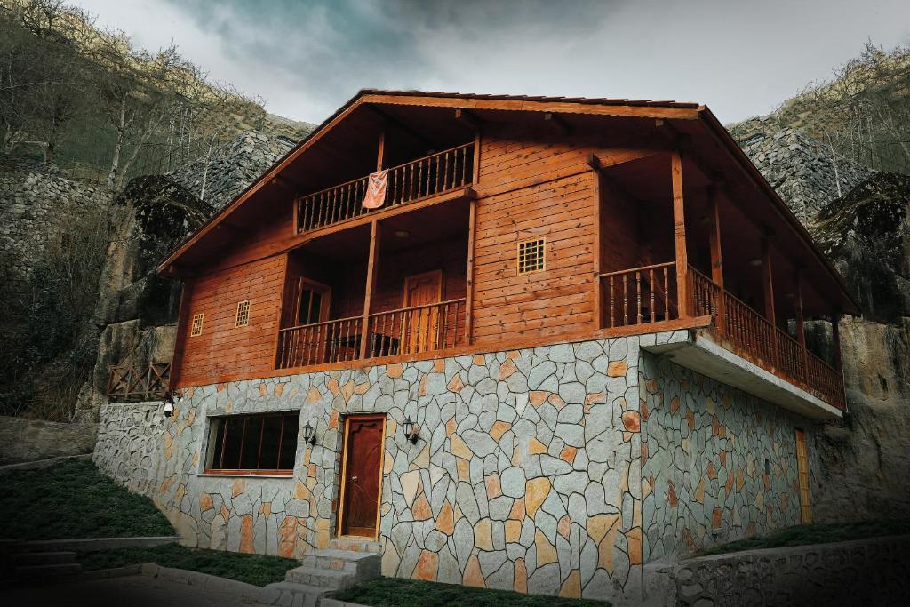 a building with a balcony on top of it at Havva Sultan Konağı in Trabzon