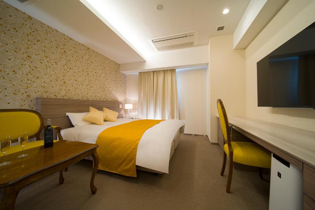 TV a/nebo společenská místnost v ubytování HOTEL LASCALA