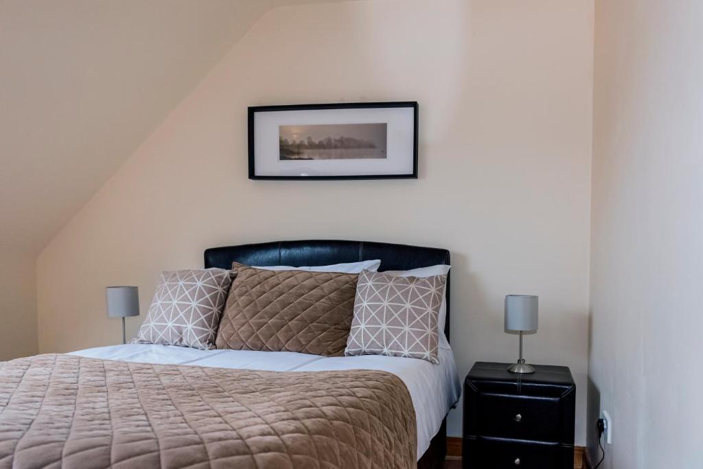 Postel nebo postele na pokoji v ubytování Bunhovil -3 bedroom