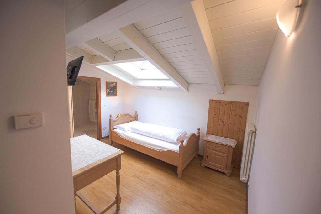 Postel nebo postele na pokoji v ubytování Agriturismo Salizzoni