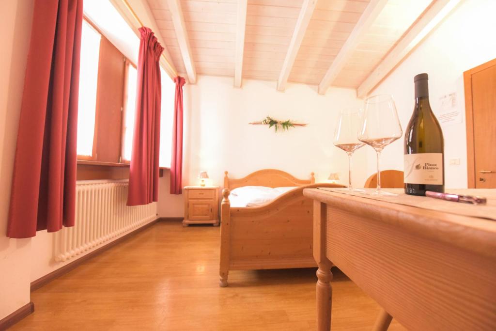 Postel nebo postele na pokoji v ubytování Agriturismo Salizzoni
