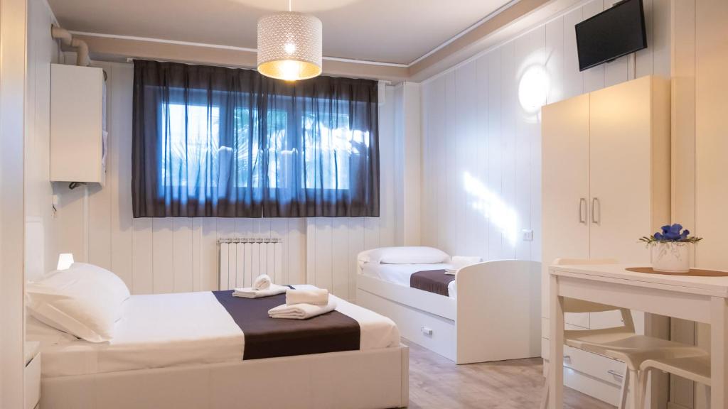 Postel nebo postele na pokoji v ubytování Hotel Venezia Park - ENJOY HOLIDAY