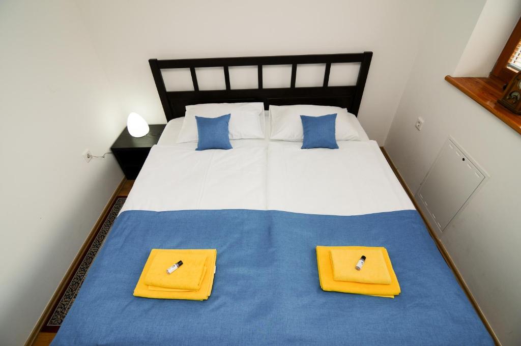 Postel nebo postele na pokoji v ubytování Pierta Apartment