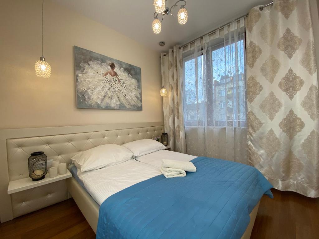 Posteľ alebo postele v izbe v ubytovaní P&J Luxury Apartments