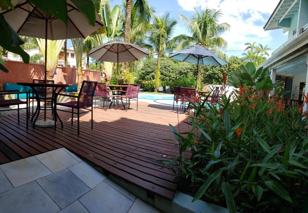 Um jardim em Pousada Toca da Praia