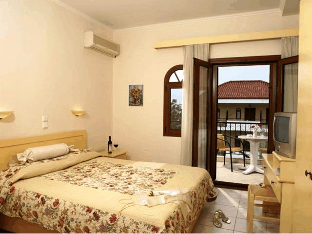 Postel nebo postele na pokoji v ubytování Hotel Calypso