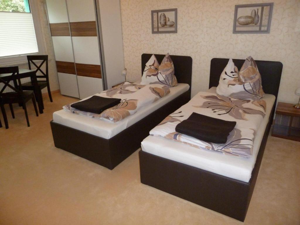 Postel nebo postele na pokoji v ubytování Apartment Erfordia Erfurt am Egapark