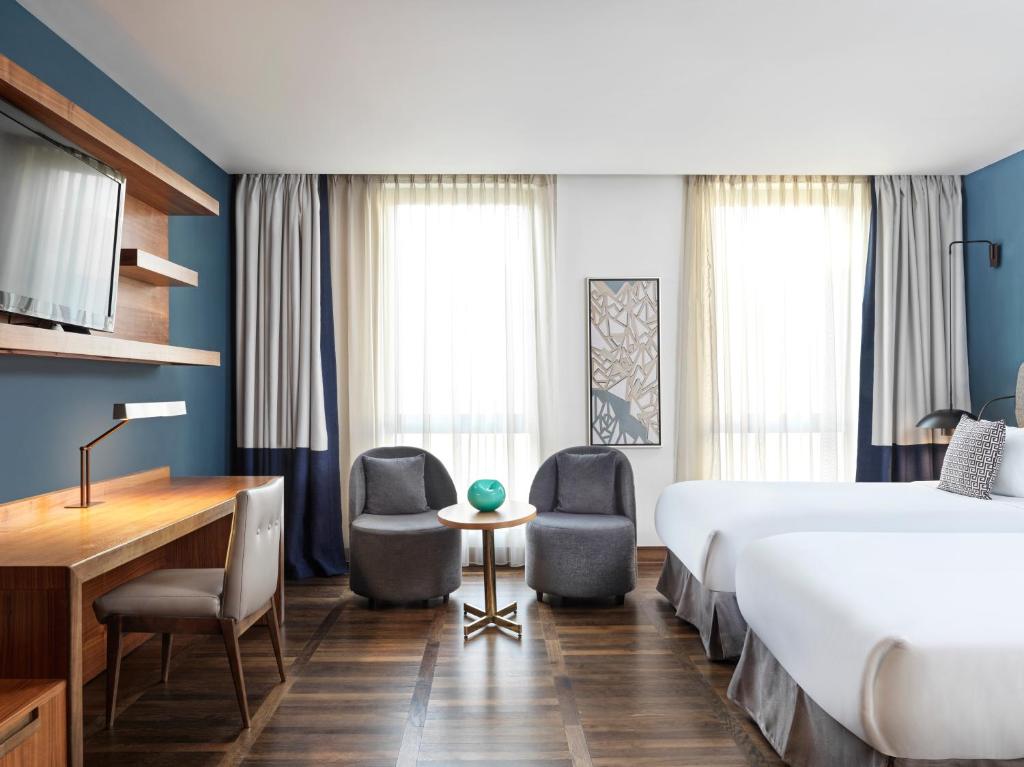 Letto o letti in una camera di Metropol Palace, Belgrade