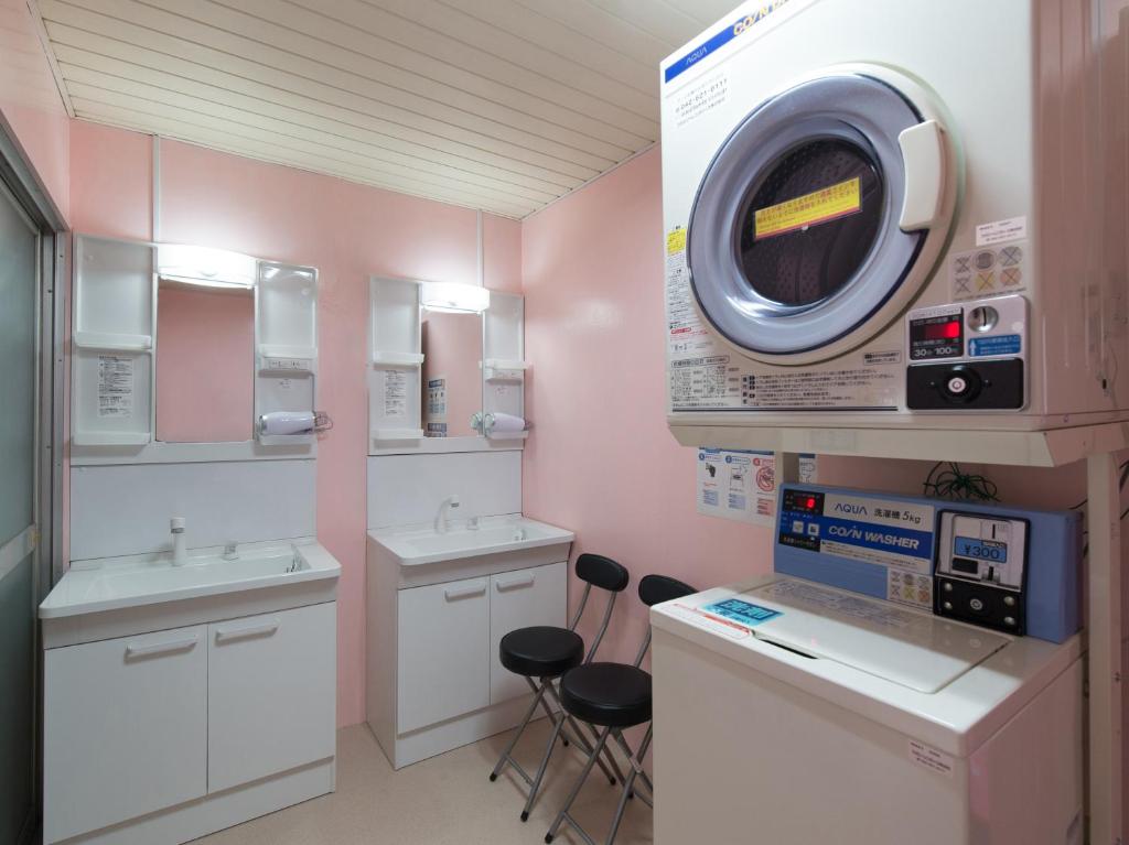 Kuchyň nebo kuchyňský kout v ubytování Tabist Hotel Aihama Beppu