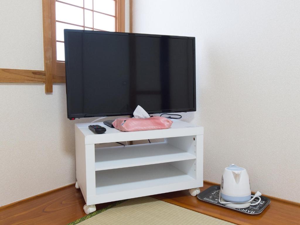 TV a/nebo společenská místnost v ubytování Tabist Hotel Aihama Beppu