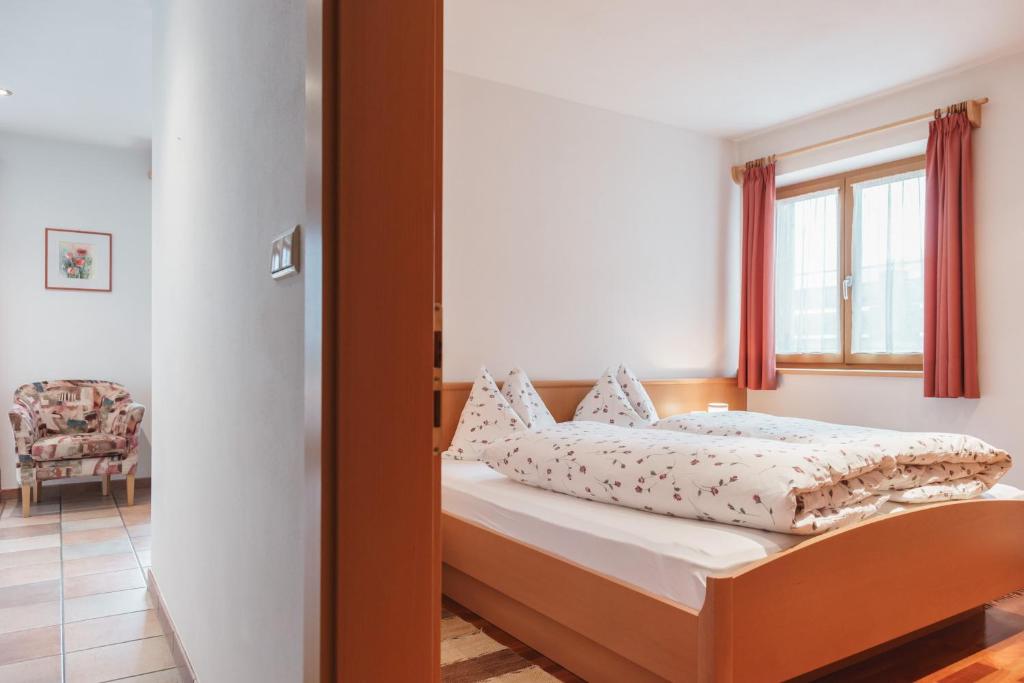 Łóżko lub łóżka w pokoju w obiekcie Residence Karnutsch
