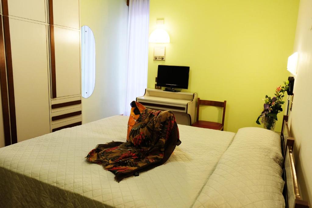 TV a/nebo společenská místnost v ubytování Hotel Palazzi