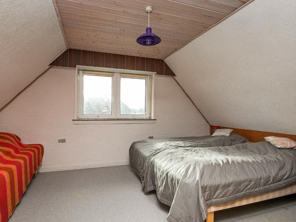 Postel nebo postele na pokoji v ubytování 6 person holiday home in Ulfborg