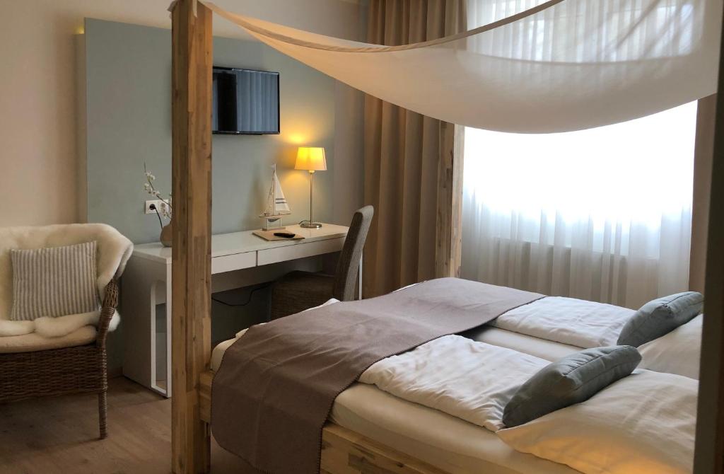 Postel nebo postele na pokoji v ubytování Hotel Restaurant FIDI