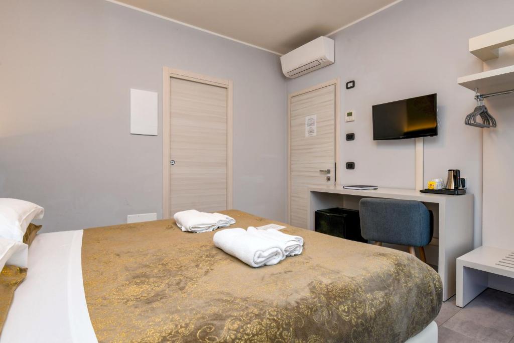 Postel nebo postele na pokoji v ubytování Garda Diamant