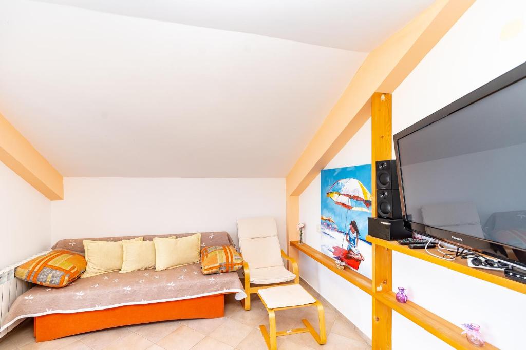 TV a/nebo společenská místnost v ubytování Villa Castello Residence