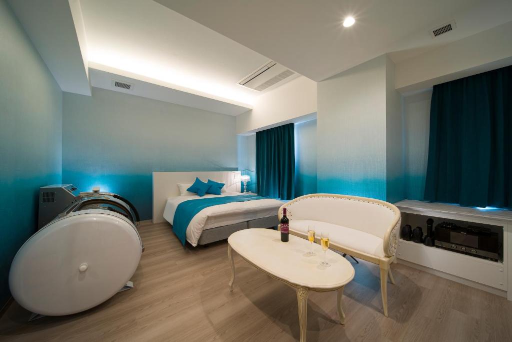 Postel nebo postele na pokoji v ubytování HOTEL LASCALA