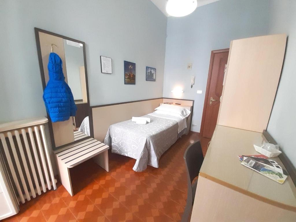 Postel nebo postele na pokoji v ubytování Hotel Alba Torino centro