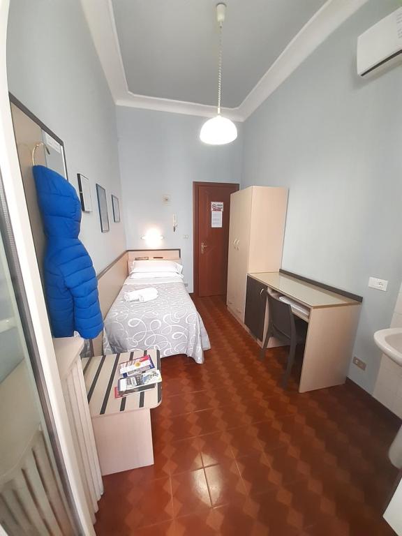 Postel nebo postele na pokoji v ubytování Hotel Alba Torino centro