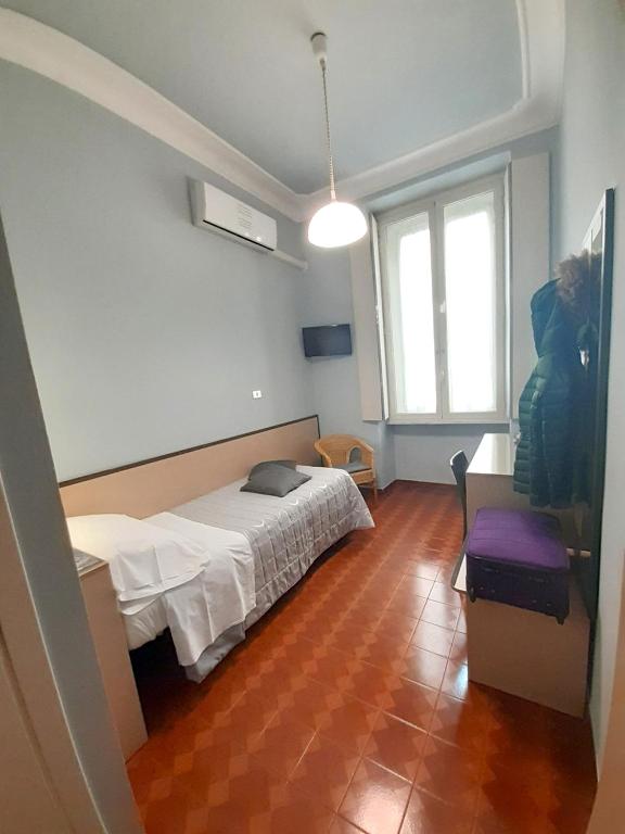 Postel nebo postele na pokoji v ubytování Hotel Alba Torino centro