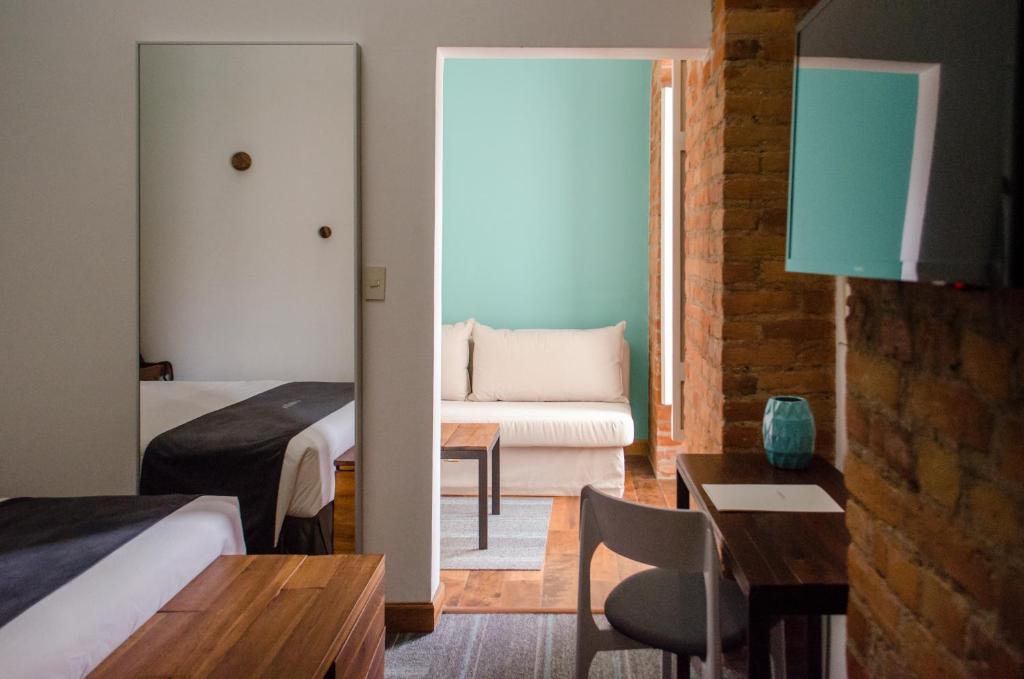 Posezení v ubytování Carlota Sustainable Design Hotel