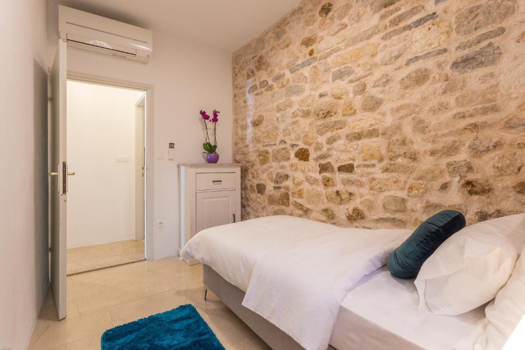 Posteľ alebo postele v izbe v ubytovaní Lola Apartments - ZF Hvar