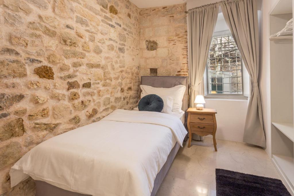 Posteľ alebo postele v izbe v ubytovaní Lola Apartments - ZF Hvar
