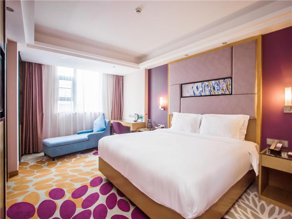 Postel nebo postele na pokoji v ubytování Lavande Hotel Zhanjiang Guomao