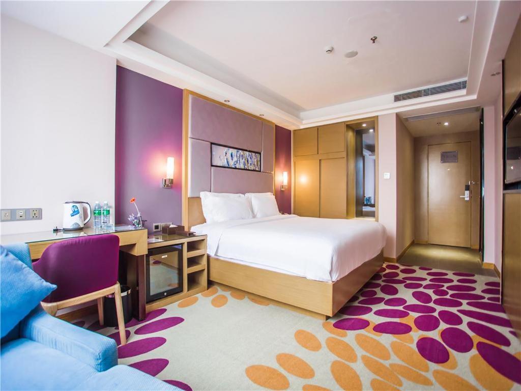 Postel nebo postele na pokoji v ubytování Lavande Hotel Zhanjiang Guomao