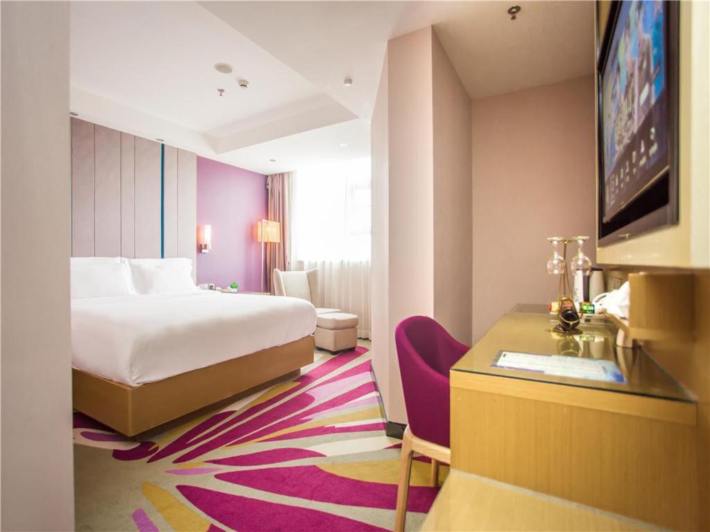Postel nebo postele na pokoji v ubytování Lavande Hotel Zhanjiang Guomao