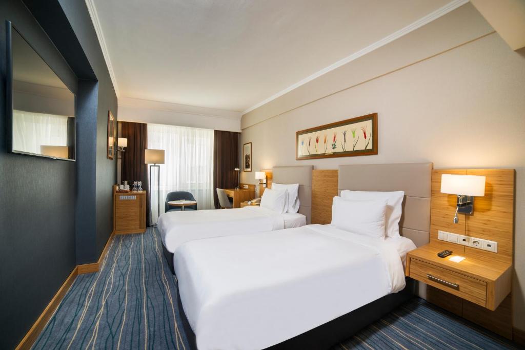 Postel nebo postele na pokoji v ubytování Radisson Hotel President Old Town Istanbul