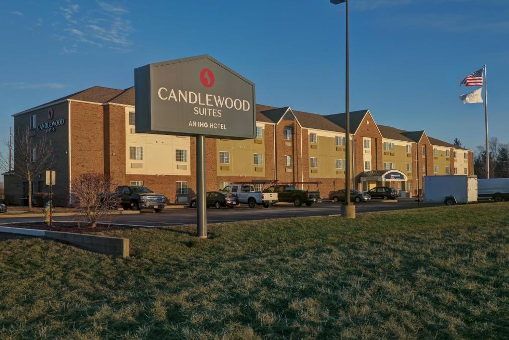 a sign in front of a building at Candlewood Suites Indianapolis - South, an IHG Hotel in Greenwood