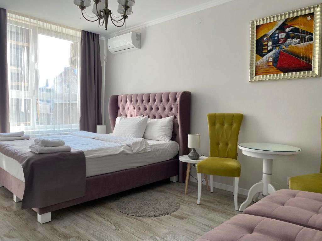Letto o letti in una camera di Opera Center Hotel & Apartments