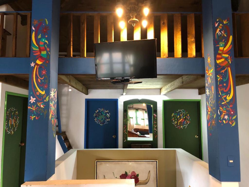 Postel nebo postele na pokoji v ubytování Spa Holistico Real Hotel