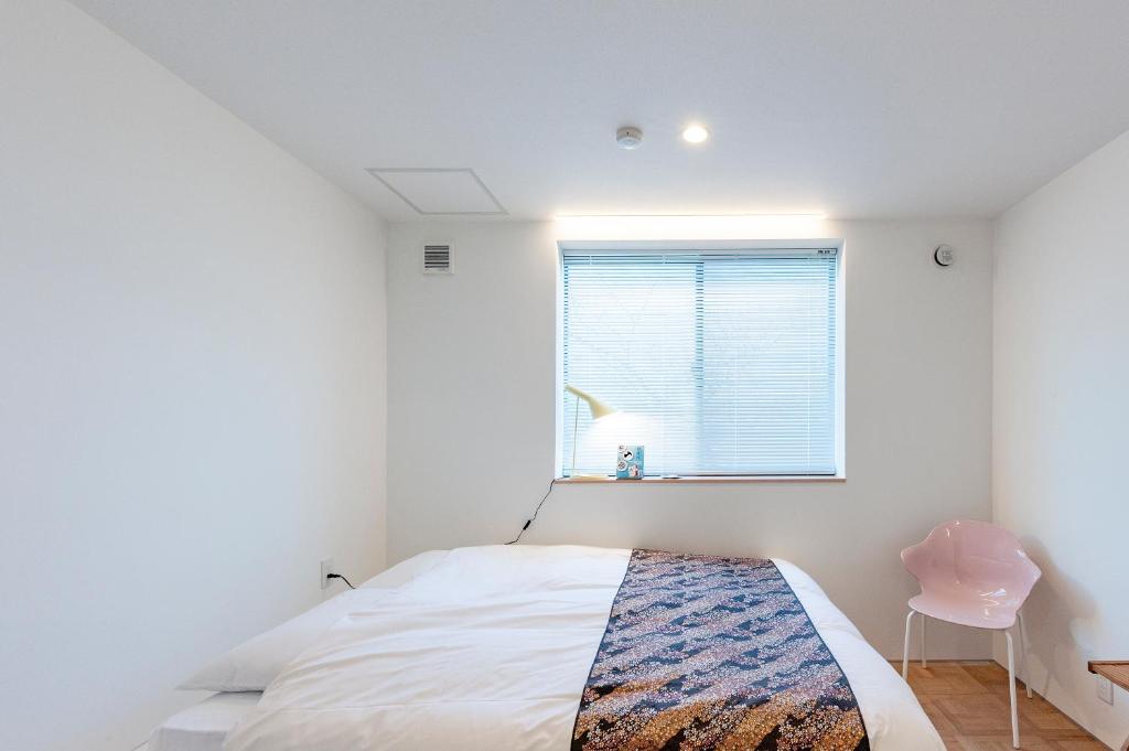 Postel nebo postele na pokoji v ubytování plat hostel keikyu haneda home