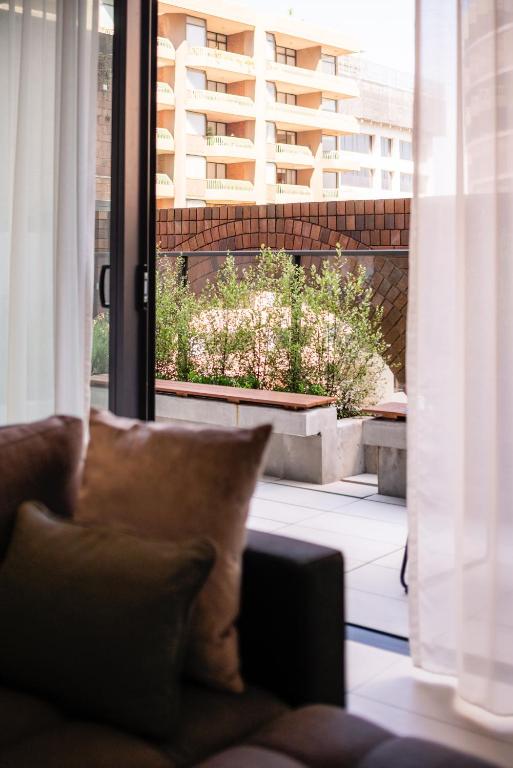 Posezení v ubytování SKYE Suites Sydney