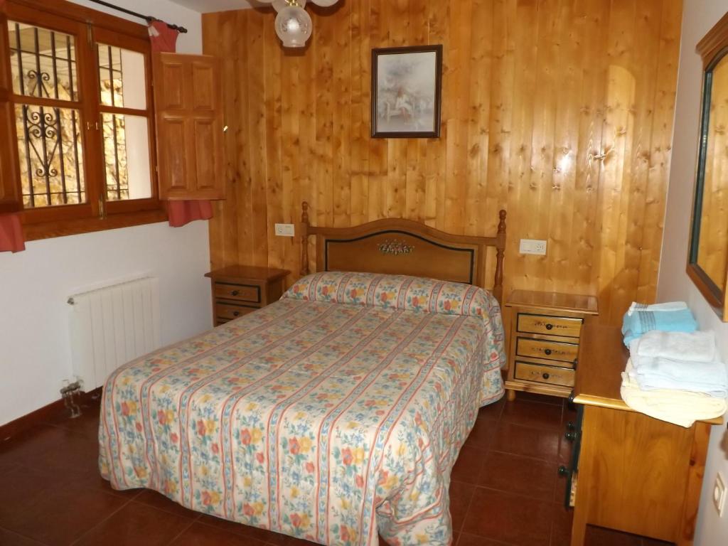 Postel nebo postele na pokoji v ubytování Alojamiento Rural Mirador del Avellano