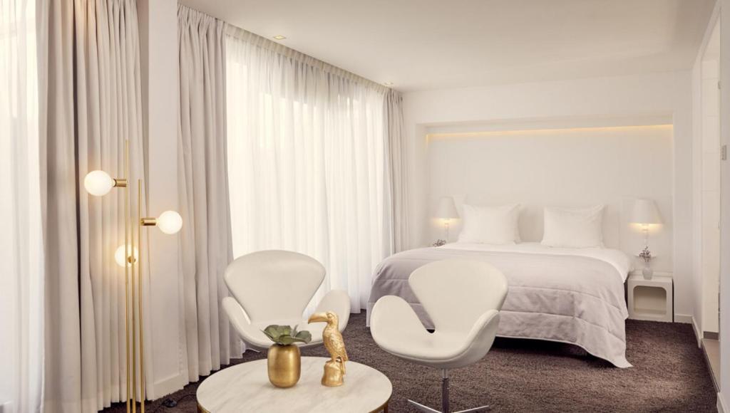 Postel nebo postele na pokoji v ubytování Van der Valk Hotel Eindhoven