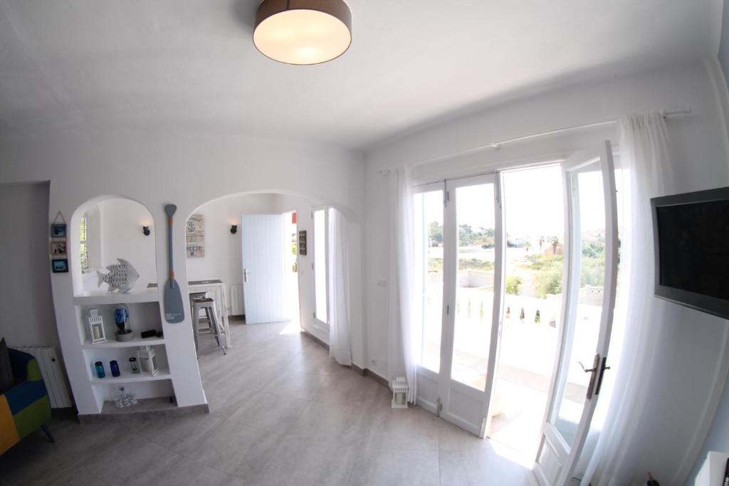 TV a/nebo společenská místnost v ubytování Casa del Mar