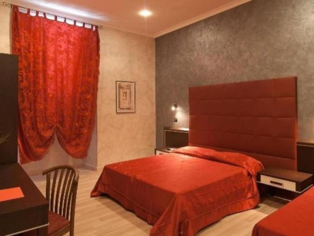 Posteľ alebo postele v izbe v ubytovaní New Inn