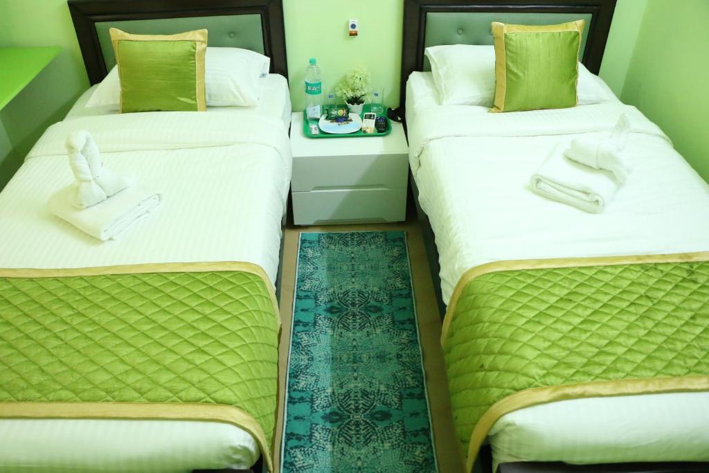 Postel nebo postele na pokoji v ubytování Hotel NKC Airport