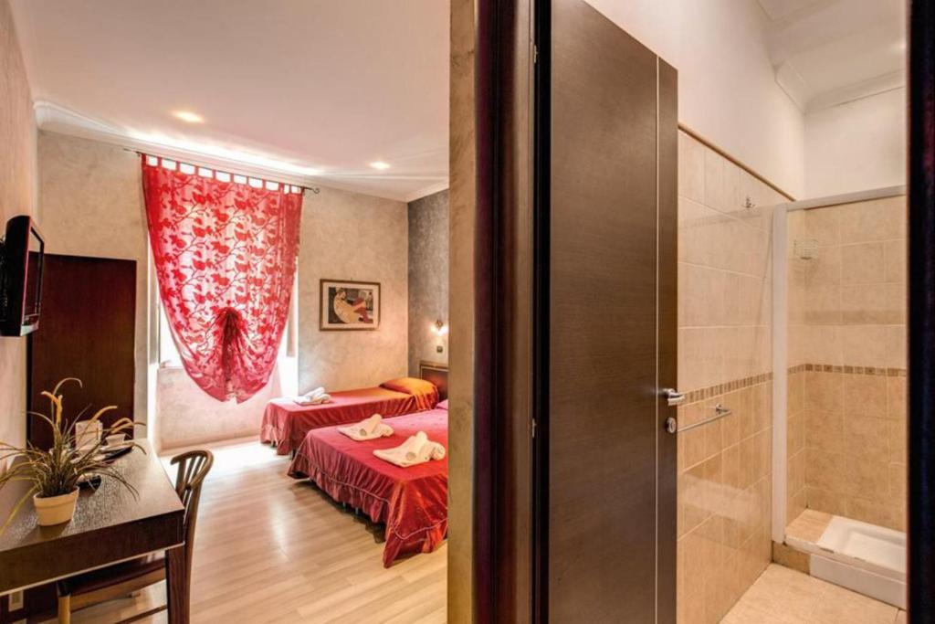 Posteľ alebo postele v izbe v ubytovaní New Inn