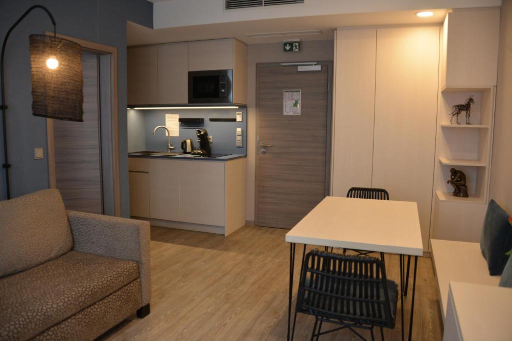 Kuchyň nebo kuchyňský kout v ubytování Belle Blue Zentrum