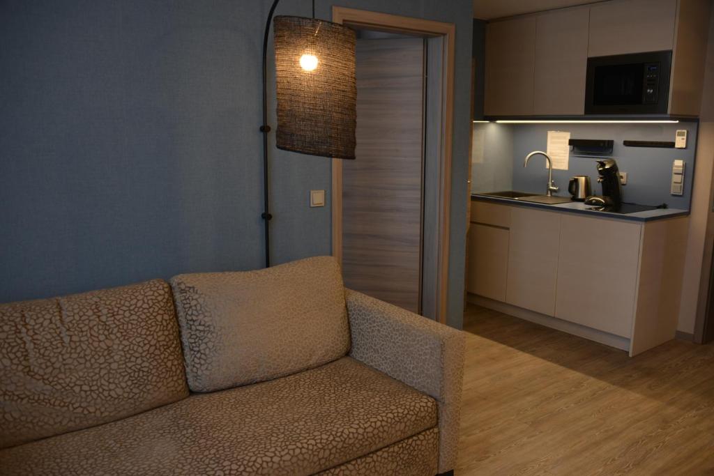 Kuchyň nebo kuchyňský kout v ubytování Belle Blue Zentrum
