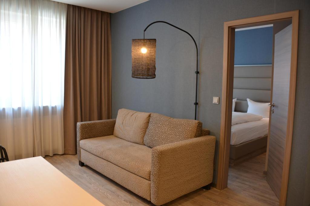 Postel nebo postele na pokoji v ubytování Belle Blue Zentrum