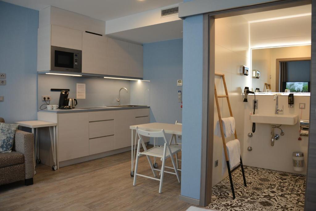 Kuchyň nebo kuchyňský kout v ubytování Belle Blue Zentrum