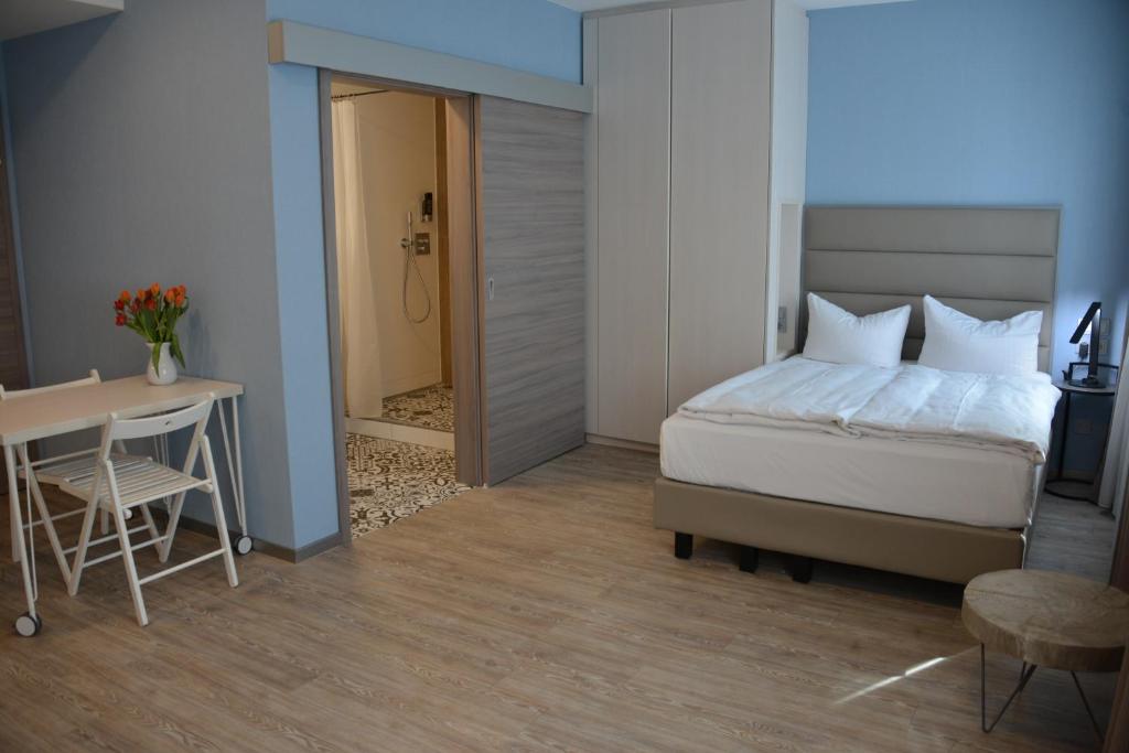 Postel nebo postele na pokoji v ubytování Belle Blue Zentrum