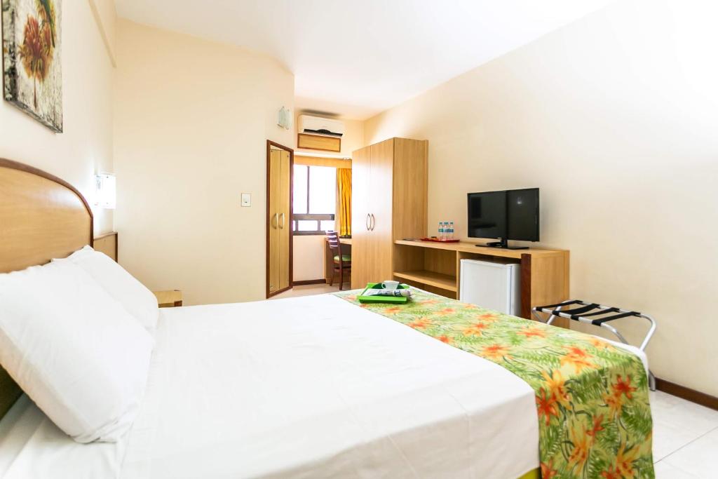 Postel nebo postele na pokoji v ubytování Hotel Verdemar