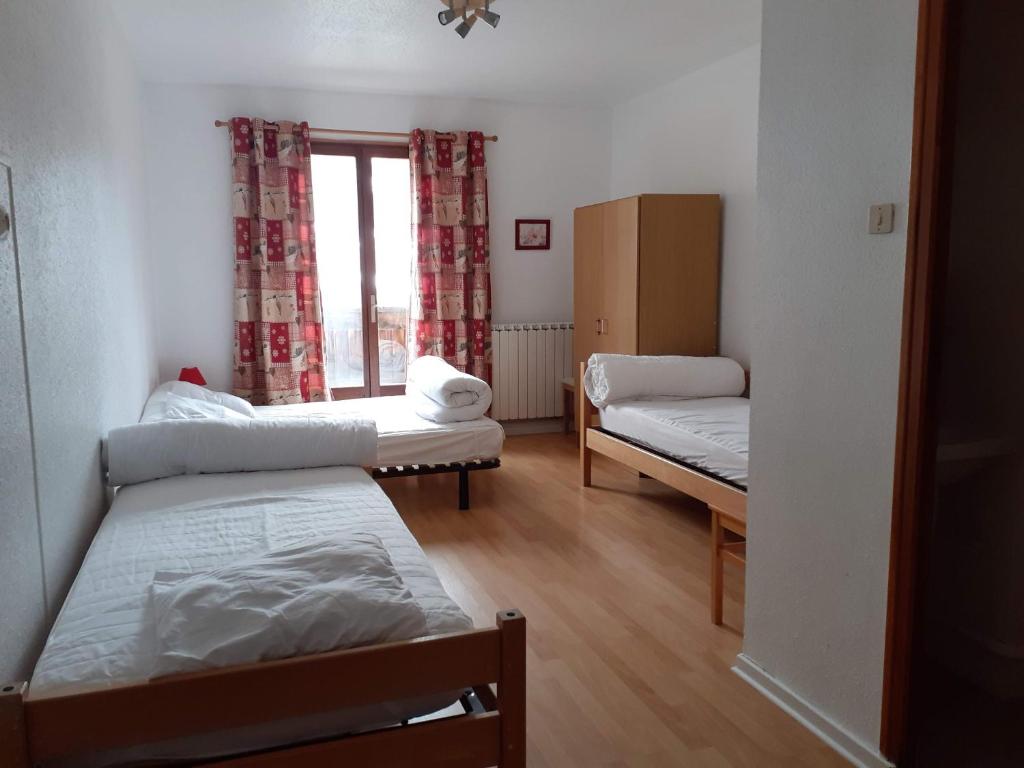 Postel nebo postele na pokoji v ubytování Gite de la Draye