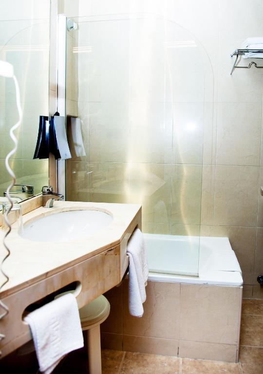 Koupelna v ubytování Hotel Universal
